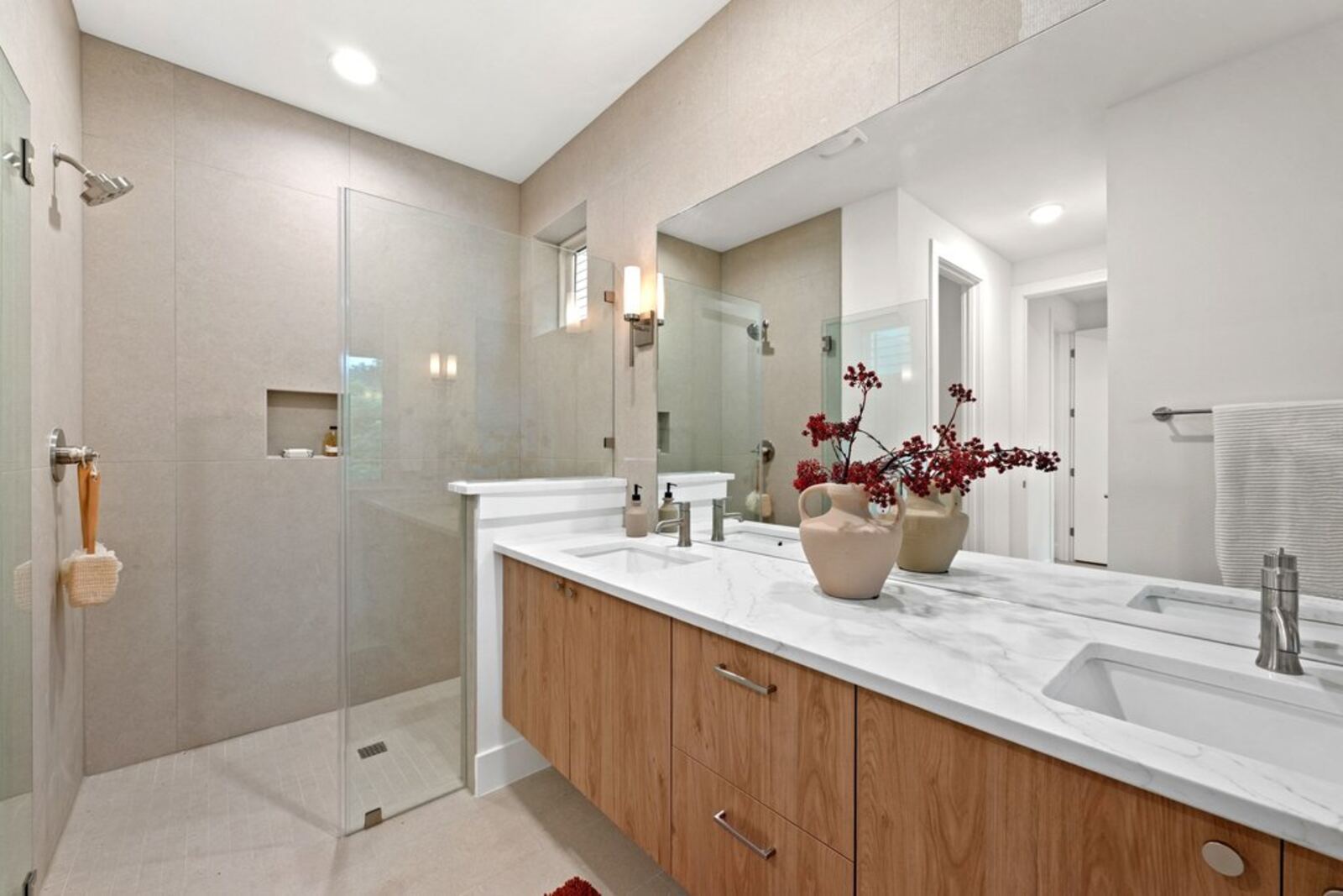 Primary bathroom with double vanity and walk-in shower