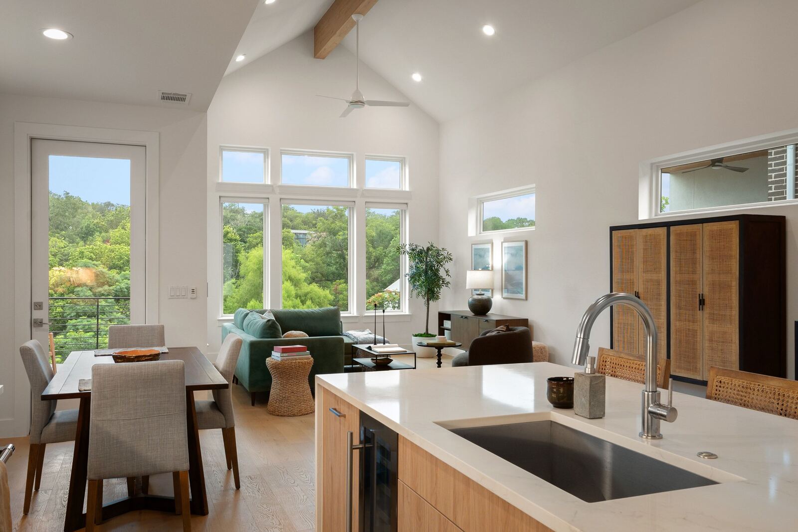 Living and dining space open to the kitchen island